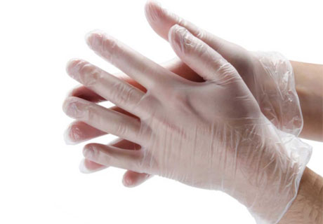 Disposable plastic hand gloves